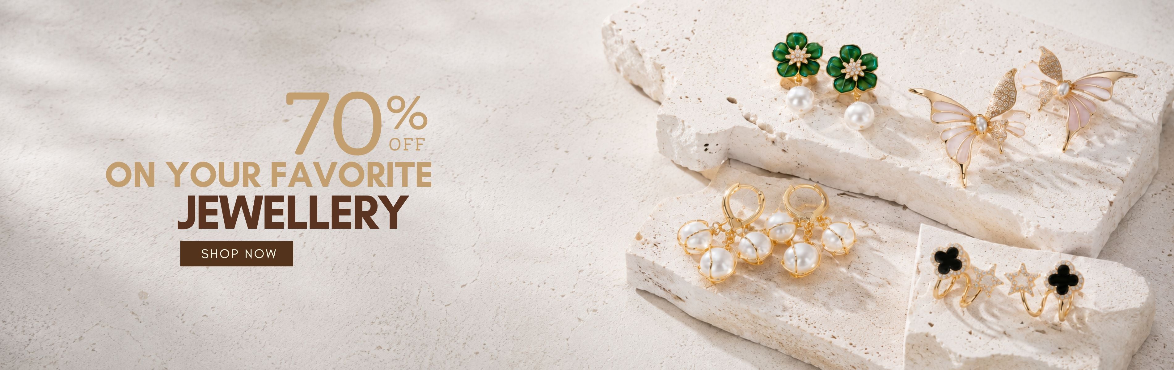 Jewellery set with earrings and rings featuring a jewelry sale banner.